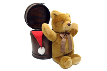 Old case with chrismas hat and teddybear