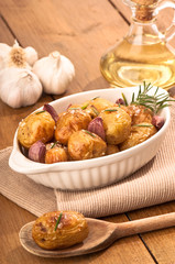 Obraz na płótnie Canvas Roasted Potatoes With Garlic