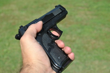 Pistola in una mano