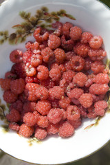 Fresh raspberry in a vase