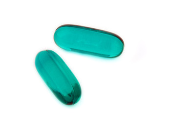 Two green gel pills