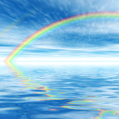 Rainbow on the aquamarine water