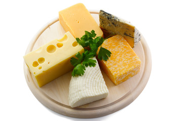 Various cheeses on catting board