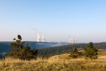 Fototapeta na wymiar Nuclear power plant at dawn