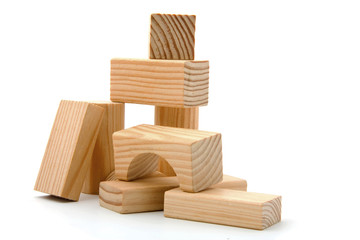 Wooden building blocks over white background