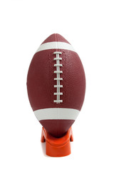 American Football on a kicking tee