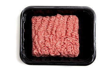 Ground hamburger meat on a white background