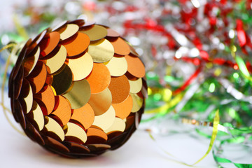 christmas ball at bright, colored background
