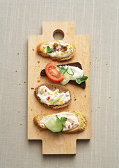 toasts with soft cheese toppings