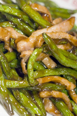 chinese food chicken strips with string beans