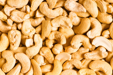 Cashew nuts arranged at the background