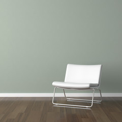 white modern chair on green wall