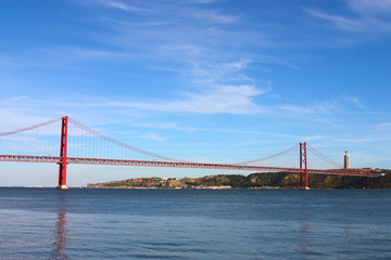 Fototapeta na wymiar Large bridge over river in Lisbon