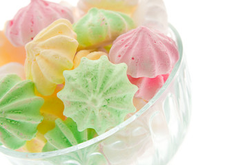 Colour meringues in a vase.  Isolated.