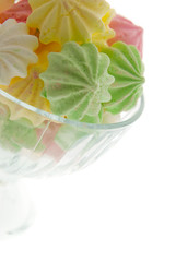 Colour meringues in a vase.  Isolated.