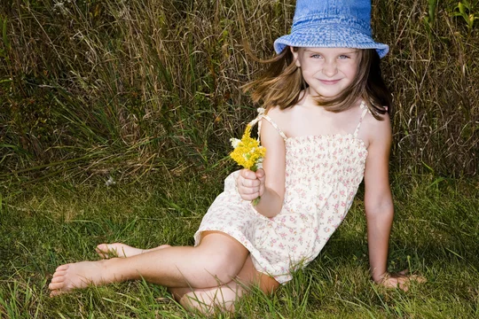 Little girl in short dress. Stock Photo