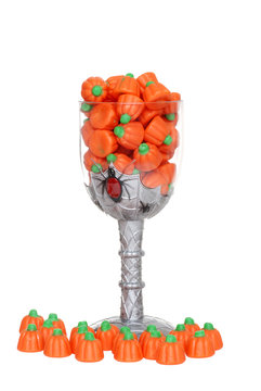glass filled with pumpkin candy