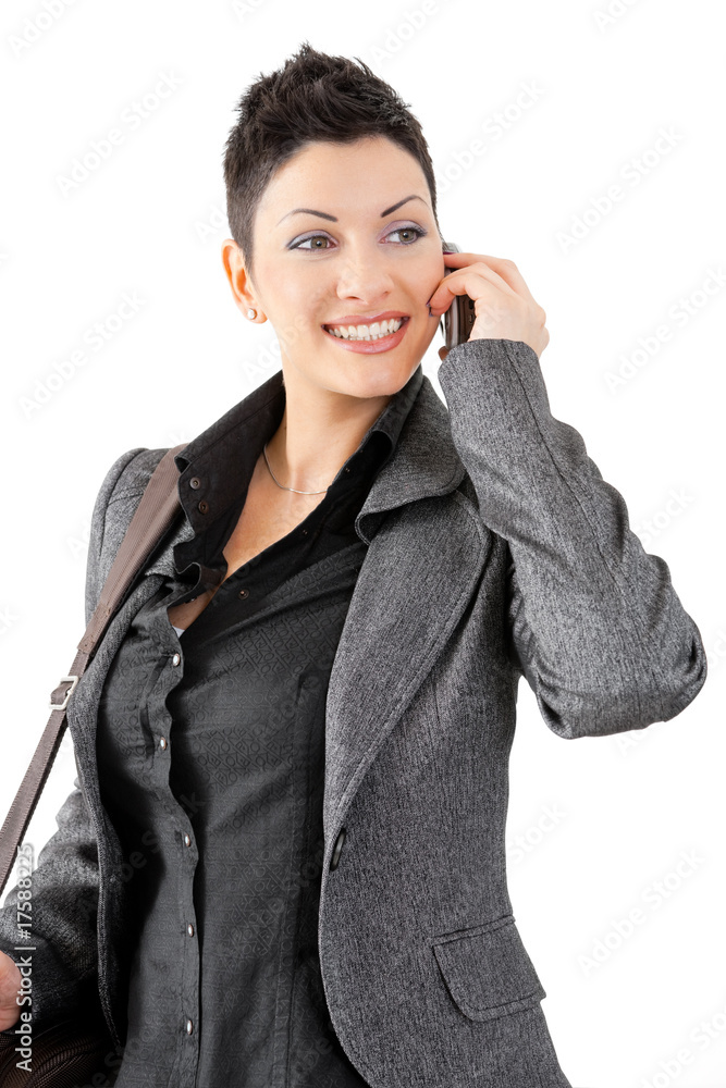 Wall mural businesswoman calling on mobile