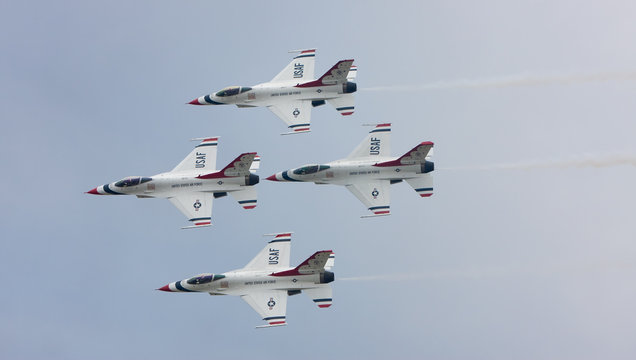 The U.S. Air Force F-16 Thunderbirds fly in diamond formation - Powered by Adobe
