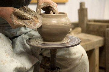 Artisan working on a potter's wheel