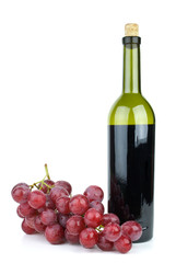 Wine bottle and grapes isolated on the white background