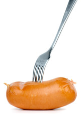Fork and sausage isolated on the white background