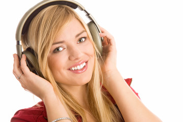 Young woman listening to music smiling