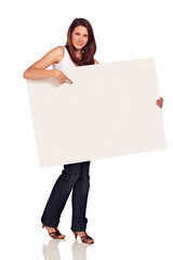 Beautiful woman point at white board in her hand