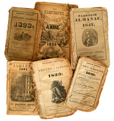 A collection of very old farmer's almanacs.