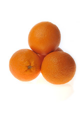 three oranges isolated on white