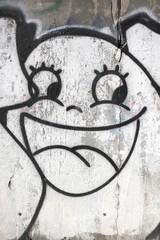 Smiling face, urban graffiti background