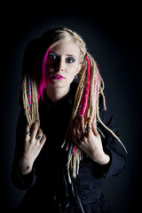 portrait of young woman with dreadlocks