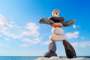Figurine against the sky