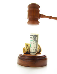 judges gavel about to pound on money
