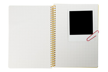 Spiral notepad and black instant photo
