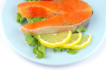 salmon steak on blue dish