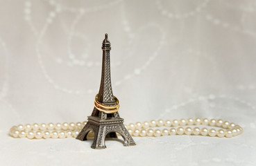 Just married in Paris. Two wedding rings on the Eiffel Tower