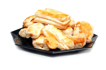 Tasty cake on the plate isolated on white