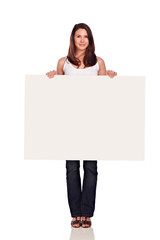 Young woman holding white board