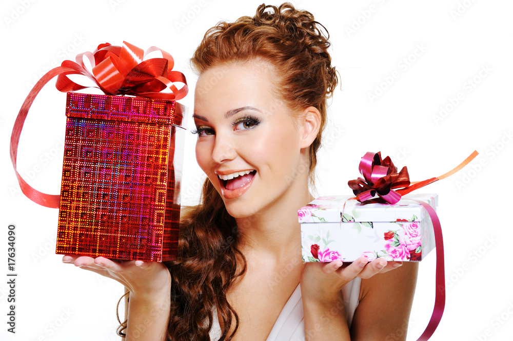 Wall mural happy woman choosing between two presents