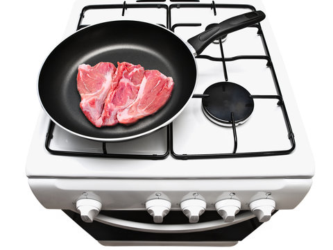 frying pan with raw meat