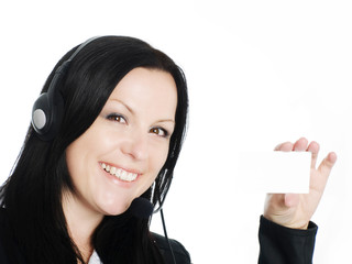 smiling brunette woman with headphone holding businesscard