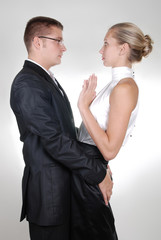 a businessman touching his secretary's back