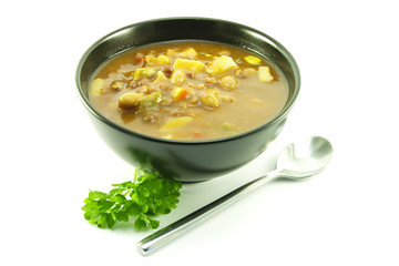 Vegetable Soup in a Black Bowl