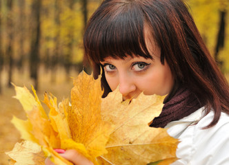 The girl in an autumn forest