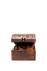 A wooden ancient chest full of money..