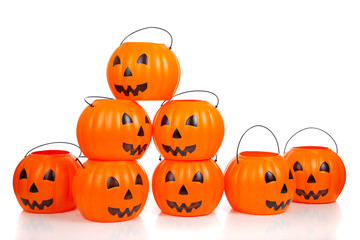 Jack-o-lantern buckets stacked up