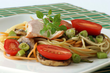 smoked trout with colored spaghetti and vegetable