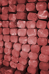 Fence posts or lumber stacked up and ready to use