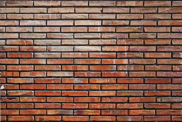 Abstract orange wall made of bricks. Good as background.